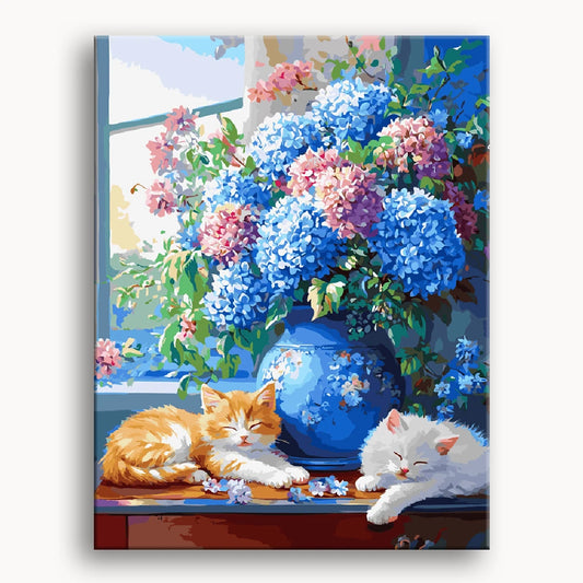 A colorful painting featuring two playful cats beside a vibrant vase of flowers.