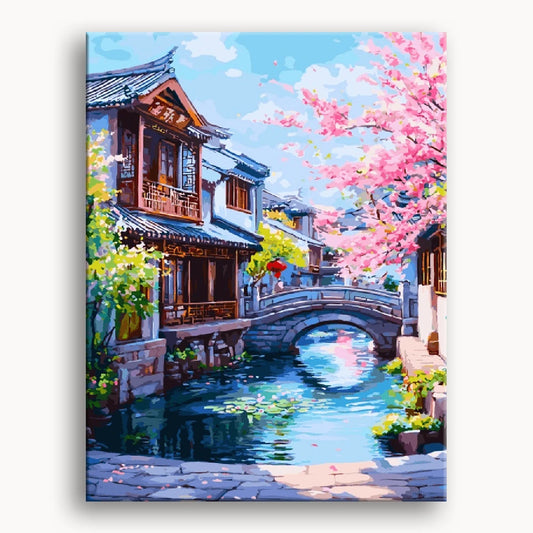 A serene painting of a village with a river flowing under a charming bridge.