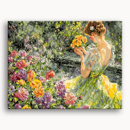 A painting of a woman in a flowing green dress, gently holding a bouquet of colorful flowers.