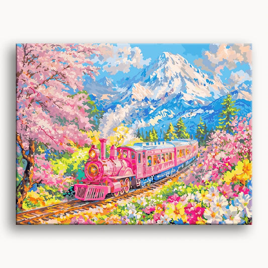 A pink train travels through a vibrant field of colorful flowers under a clear blue sky.