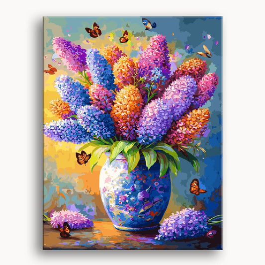 A painting featuring a vase filled with vibrant purple and blue flowers against a soft background.